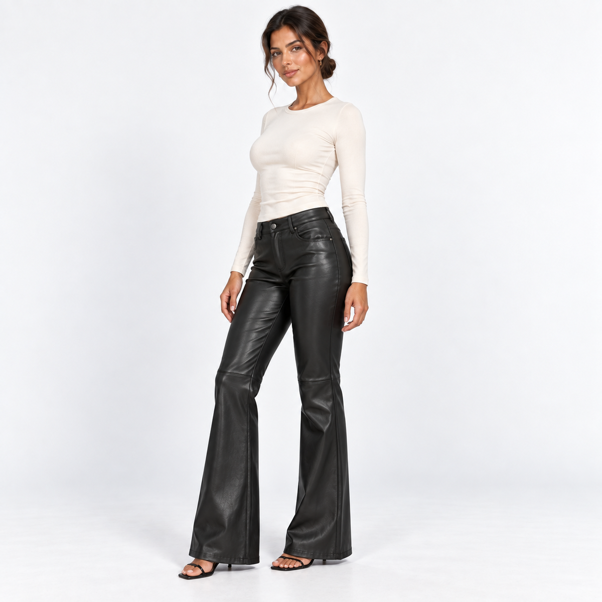 Faux-Leather Flared Trousers — Black — front45 view