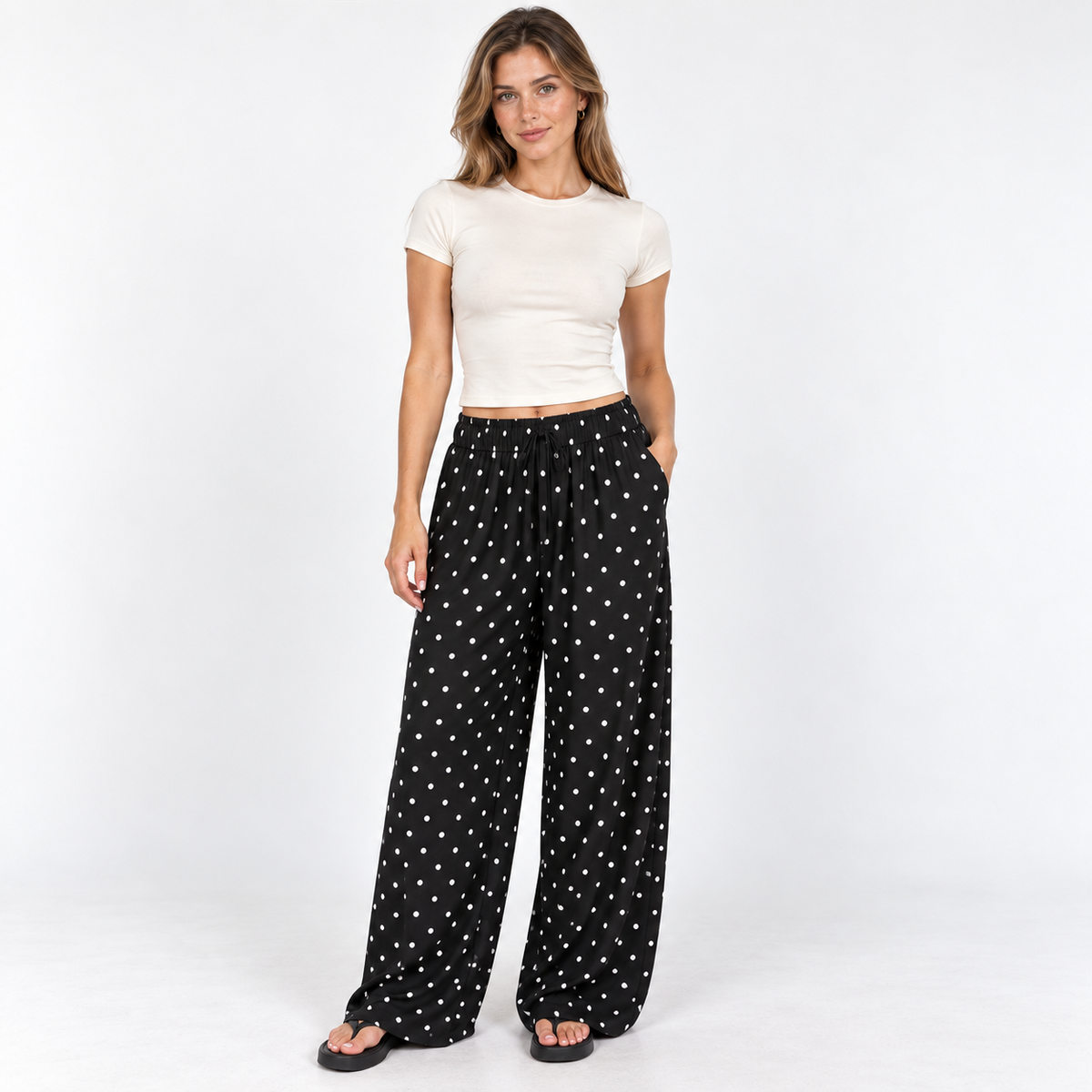 Polka Dot Wide-Leg Trousers — Black — front view