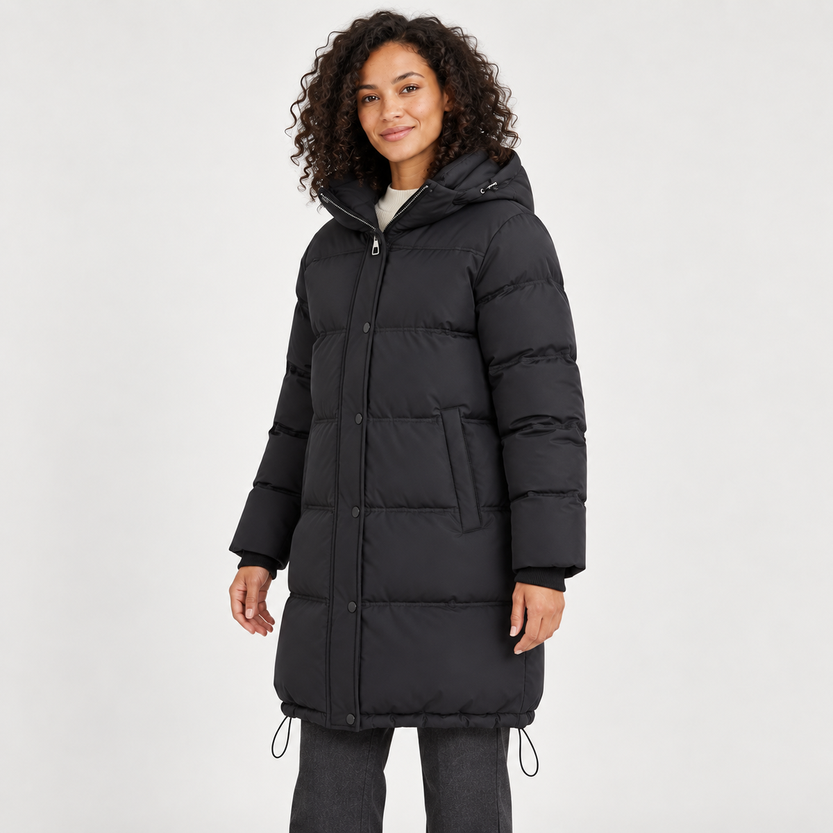 Women's Hooded Longline Puffer Coat in black – angled view