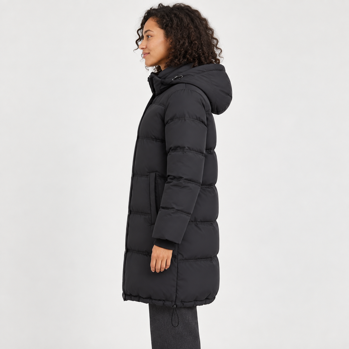 Women's Hooded Longline Puffer Coat in black – side view